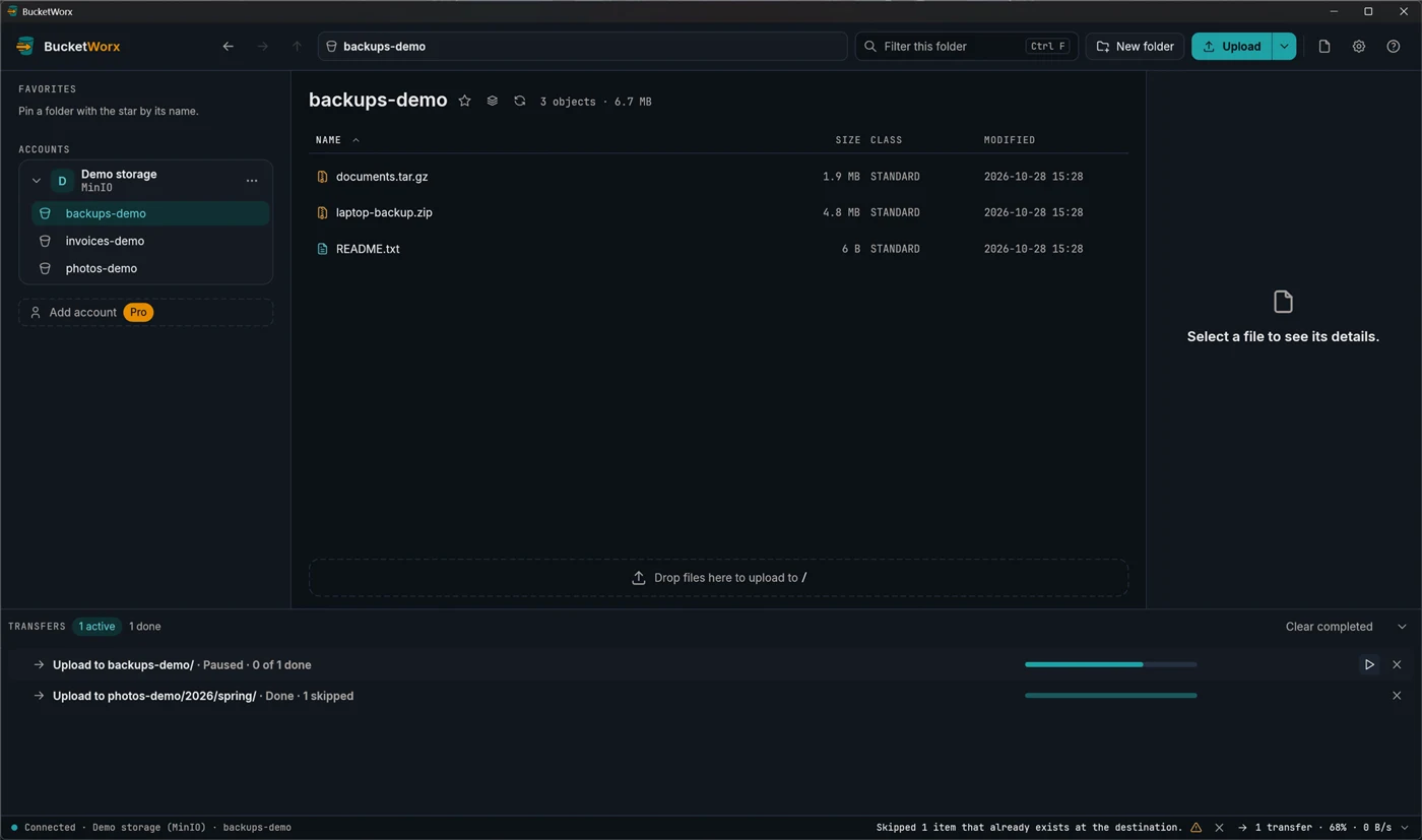 The transfers drawer with the upload paused partway and a resume button.